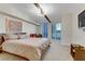 Comfortable bedroom with a king bed, nightstand and access to a balcony at 2777 Paradise Rd # 2001, Las Vegas, NV 89109
