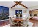 Modern dining room featuring hardwood floors, a round table, and dramatic night views at 2777 Paradise Rd # 2001, Las Vegas, NV 89109