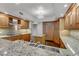 Spacious kitchen with granite countertops, wood cabinets and island at 2777 Paradise Rd # 2001, Las Vegas, NV 89109