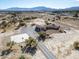 Aerial showcasing the home and surrounding landscape at 3281 Mark Rd, Pahrump, NV 89060