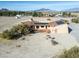 Aerial view of house with solar panels and large lot at 3281 Mark Rd, Pahrump, NV 89060