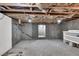 Unfinished basement with storage shelving at 3281 Mark Rd, Pahrump, NV 89060