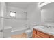 Clean bathroom with a shower/tub combo and wood vanity at 3281 Mark Rd, Pahrump, NV 89060