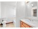 Clean bathroom with a shower/tub combo and wood vanity at 3281 Mark Rd, Pahrump, NV 89060