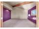 Spacious bedroom with window and purple walls at 3281 Mark Rd, Pahrump, NV 89060