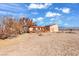 Single story home with solar panels and deck at 3281 Mark Rd, Pahrump, NV 89060