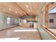 Open kitchen with island, wood cabinets and views at 3281 Mark Rd, Pahrump, NV 89060