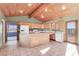 Bright kitchen with island and wood cabinets at 3281 Mark Rd, Pahrump, NV 89060