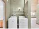 Convenient laundry room with washer, dryer, and extra shelving at 3281 Mark Rd, Pahrump, NV 89060