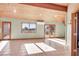Spacious living room with access to deck and scenic views at 3281 Mark Rd, Pahrump, NV 89060