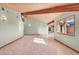 Spacious living area with wood beams and natural light at 3281 Mark Rd, Pahrump, NV 89060