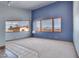 Large living room with wall of windows and mountain view at 3281 Mark Rd, Pahrump, NV 89060