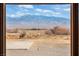 Scenic view of snow capped mountains from window at 3281 Mark Rd, Pahrump, NV 89060