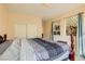 Bright bedroom with a large bed and closet, offering a view into another room at 394 Gatlinburg Ct, Henderson, NV 89012