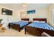 Charming bedroom with two twin beds, a TV, and plenty of space at 394 Gatlinburg Ct, Henderson, NV 89012