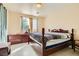 Spacious bedroom with a large bed, dresser, and ample natural light at 394 Gatlinburg Ct, Henderson, NV 89012