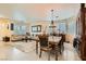Elegant dining room with a large table and hutch at 394 Gatlinburg Ct, Henderson, NV 89012