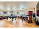 Game room with a pool table, wet bar, and hardwood floors at 394 Gatlinburg Ct, Henderson, NV 89012