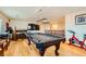 Game room boasts a pool table, wet bar, and exercise bike at 394 Gatlinburg Ct, Henderson, NV 89012