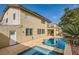 Two-story house with a pool and spa in the backyard at 394 Gatlinburg Ct, Henderson, NV 89012