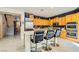 Spacious kitchen with island, stainless steel appliances, and light wood cabinets at 394 Gatlinburg Ct, Henderson, NV 89012