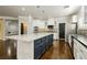 Modern kitchen with stainless steel appliances and a large island at 4021 Flaming Peak Ct, Las Vegas, NV 89129