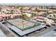 Aerial view showing tennis courts and pool at 5098 River Glen Dr # 220, Las Vegas, NV 89103
