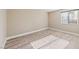 Spacious bedroom with wood-look floors and large closet at 5098 River Glen Dr # 220, Las Vegas, NV 89103