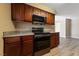 Modern kitchen with stainless steel range and microwave at 5098 River Glen Dr # 220, Las Vegas, NV 89103