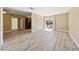 Bright living room with wood-look floors at 5098 River Glen Dr # 220, Las Vegas, NV 89103