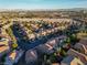 Aerial view of a residential neighborhood with houses and streets at 545 Playa Linda Pl, Las Vegas, NV 89138