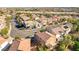 Aerial view of a residential neighborhood with houses and landscaping at 545 Playa Linda Pl, Las Vegas, NV 89138