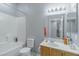 Bathroom with tub, toilet and updated vanity at 5650 E Sahara Ave # 1012, Las Vegas, NV 89142