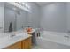Bathroom with double vanity, bathtub and shower at 5650 E Sahara Ave # 1012, Las Vegas, NV 89142