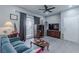 Living room with furniture, TV, and access to a patio at 5650 E Sahara Ave # 1012, Las Vegas, NV 89142