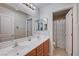 Shared bathroom with double sinks and shower at 5694 Colbert St, North Las Vegas, NV 89081