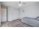Bedroom with double door closet and ceiling fan at 5694 Colbert St, North Las Vegas, NV 89081