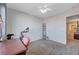 Home office in bedroom with exercise bike at 5694 Colbert St, North Las Vegas, NV 89081