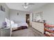 Bedroom with built-in dresser and ceiling fan at 5694 Colbert St, North Las Vegas, NV 89081