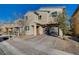 Two-story house with a two-car garage and front yard at 5694 Colbert St, North Las Vegas, NV 89081