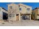 Two-story house with a two-car garage and front yard at 5694 Colbert St, North Las Vegas, NV 89081