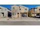 Two-story house with a two-car garage and landscaped front yard at 5694 Colbert St, North Las Vegas, NV 89081