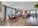 Open concept kitchen with island and hardwood floors at 5694 Colbert St, North Las Vegas, NV 89081
