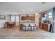 Open concept kitchen with island and hardwood floors at 5694 Colbert St, North Las Vegas, NV 89081