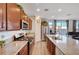 Modern kitchen featuring stainless steel appliances and granite countertops at 5694 Colbert St, North Las Vegas, NV 89081