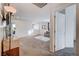 Loft hallway with an open floor plan and access to bedrooms at 5694 Colbert St, North Las Vegas, NV 89081