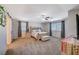 Comfortable main bedroom with plush bed and ceiling fan at 5694 Colbert St, North Las Vegas, NV 89081