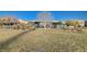 Community playground with shaded areas and play equipment at 5694 Colbert St, North Las Vegas, NV 89081