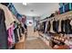 Spacious walk-in closet with ample shelving and hanging space at 5694 Colbert St, North Las Vegas, NV 89081