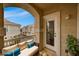 Relaxing balcony space with comfortable seating and views of the community at 5855 Valley Dr # 2045, North Las Vegas, NV 89031